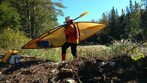 Easy portage over a beaver dam with an ultralight Wee Lassie